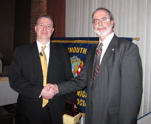 Chuck Strimpler (r), chapter president, thanks Russell Langan, deputy project manager, Warfighter Information Network-Tactical (WIN-T), for serving as the guest speaker in March.